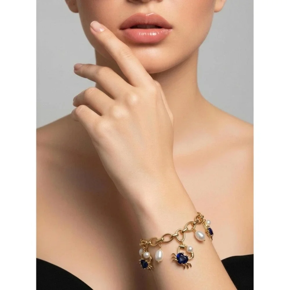 Kate‎ Spade claw out Gold Chain Bracelet with Blue Crystal & Pearl Charm